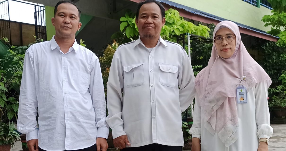 PENGGERAK. Guru Penggerak SMPN 1 Banjarmasin. Ki-ka: Haji Ahmad, Akhmad Basuki, Norliani. (foto: kemdikbud)